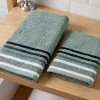 Set 1+1 asciugamano viso con ospite verde salvia con bordo a righe in tono